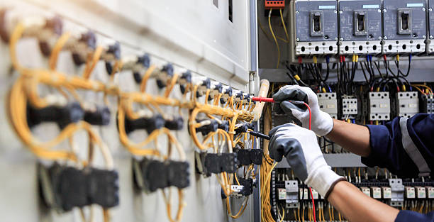 Professional Electrician technician working in St. Peter, WI